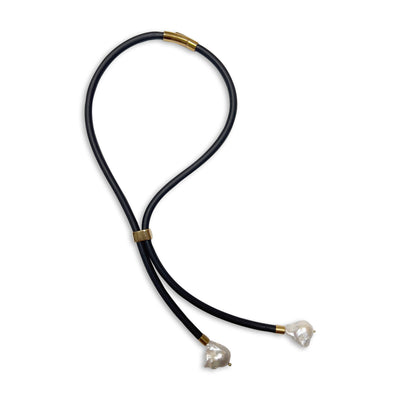 BLACK RUBBER LARIAT NECKLACE WITH GENUINE LARGE BAROQUE PEARLS ATTACHED AT ENDS. by nyet jewelry