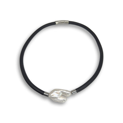 BLACK RUBBER NECKLACE WITH GENUINE FLOATING LARGE KESHI PEARL.