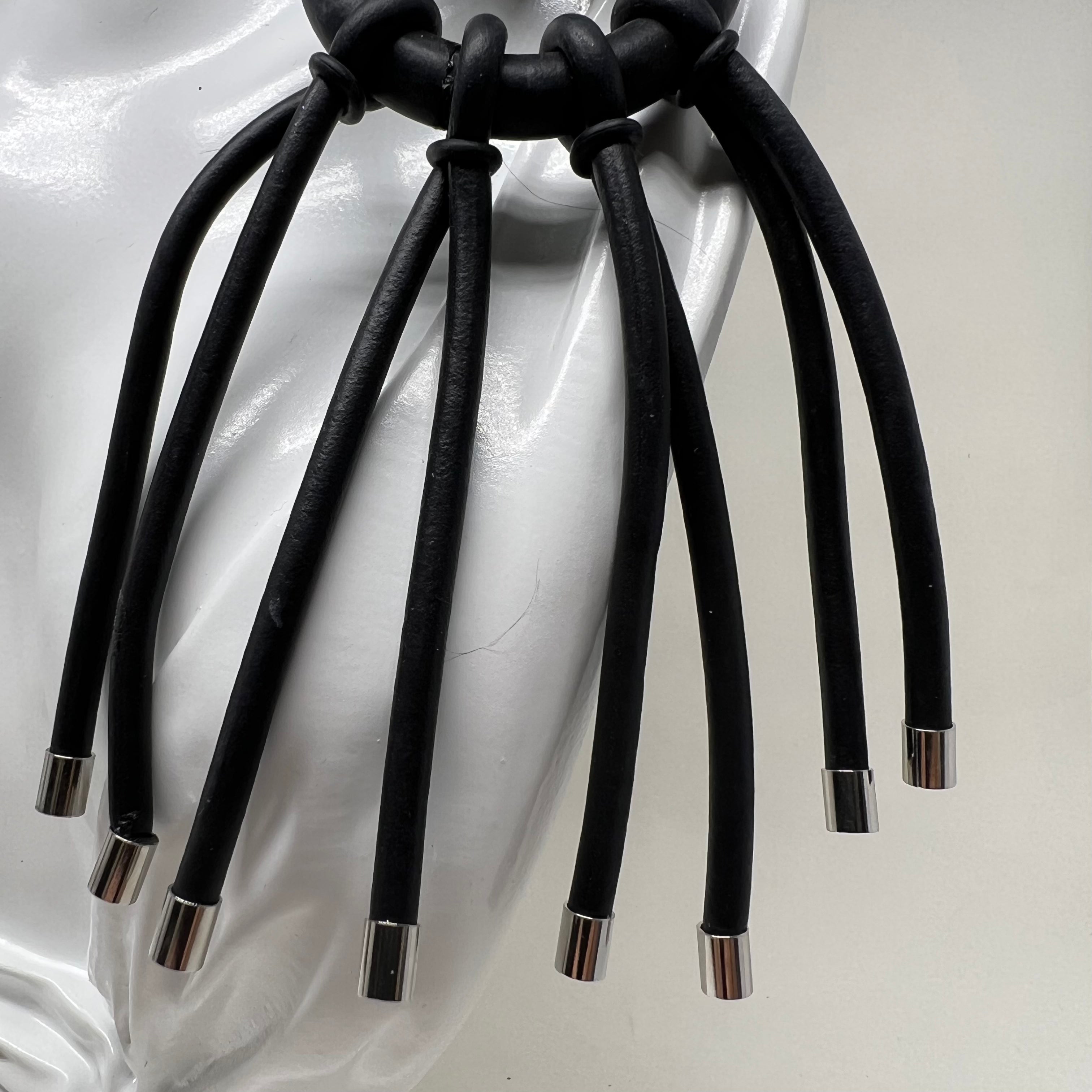 BLACK RUBBER EARRINGS WITH GOLD OR SILVER ENDCAP ACCENTS. by nyet jewelry