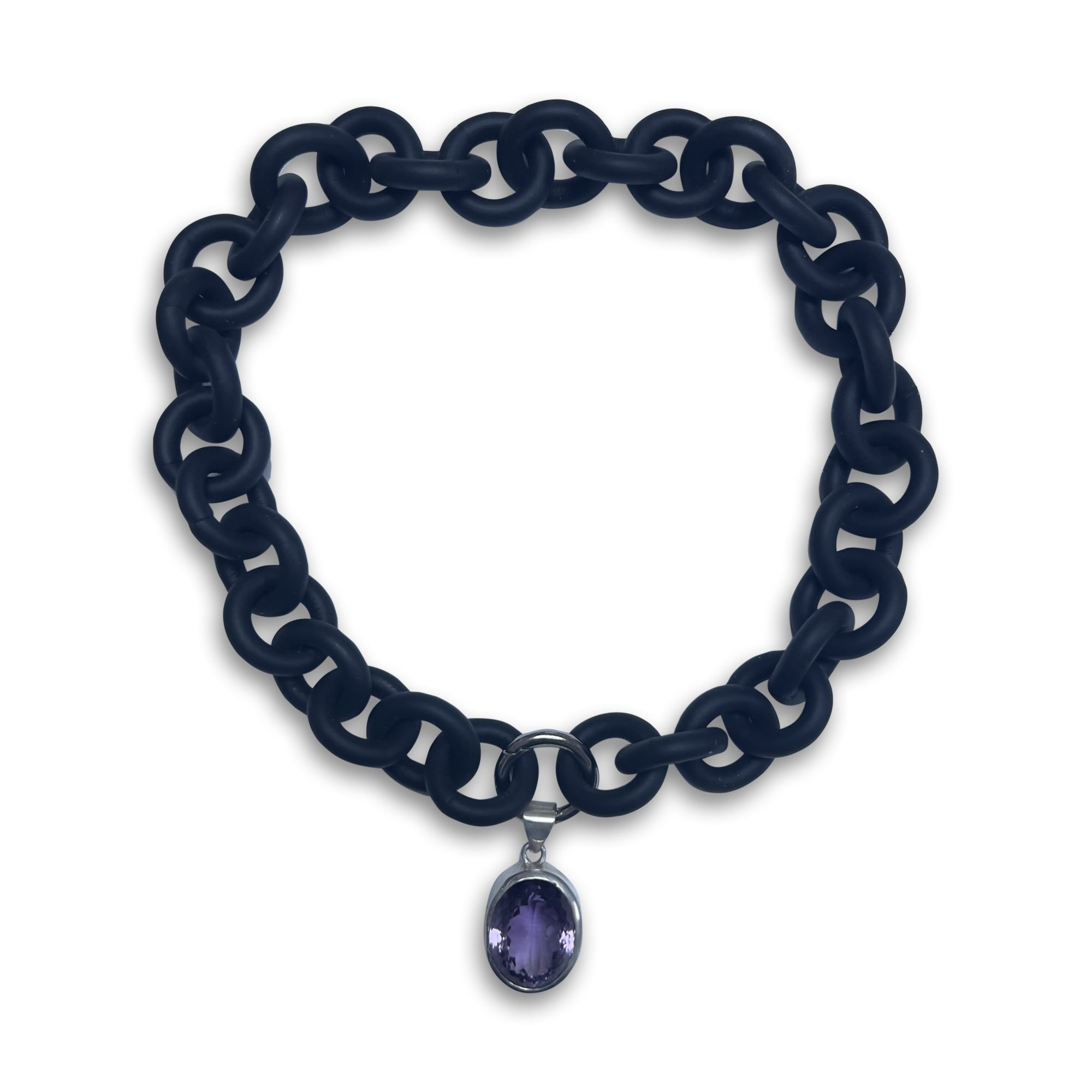 BLACK RUBBER NECKLACE WITH PENDENT BEZEL SET IN SILVER WITH A LARGE PURPLE AMETHYST STONE.