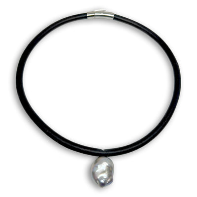BLACK RUBBER NECKLACE WITH GENUINE FLOATING LARGE BAROQUE PEARL.