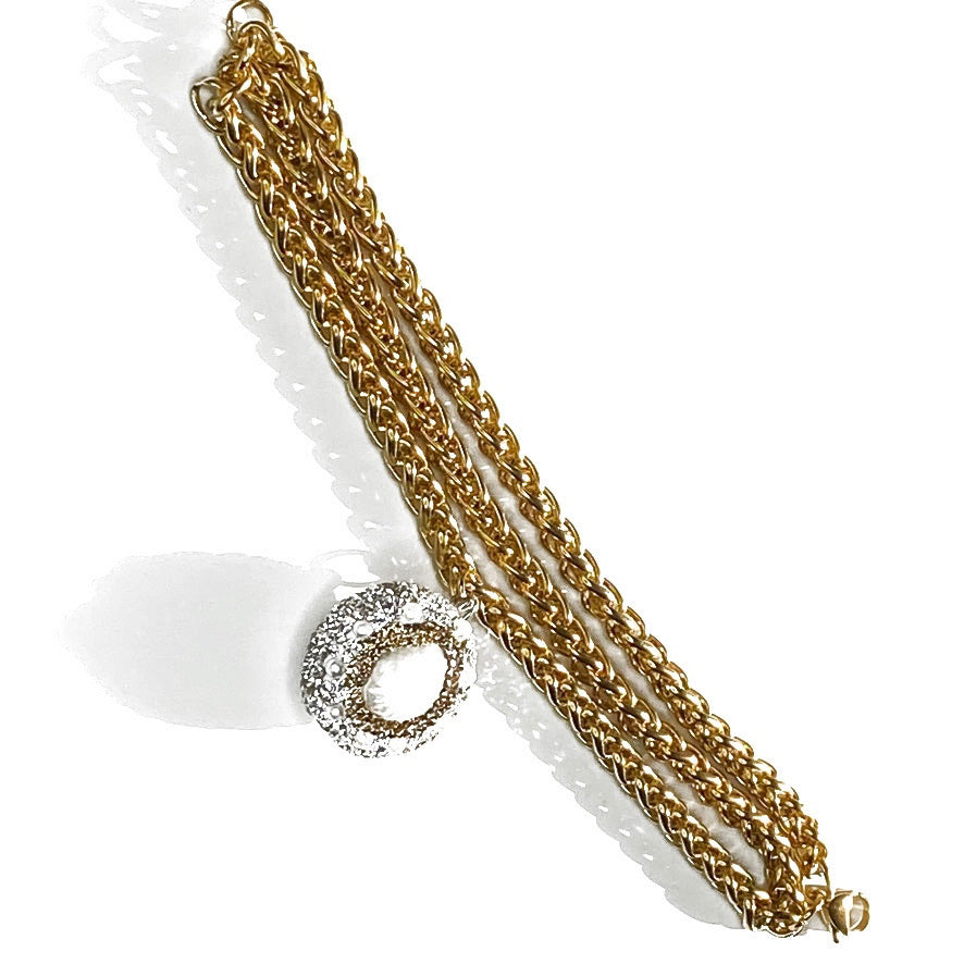 TRIPLE-STRAND GOLD OVER STAINLESS STEEL BRACELET WITH FRESH PEEARL BEAD PENDENT. by nyet jewelry