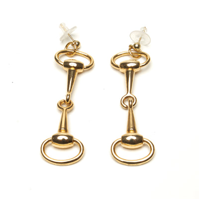 D-RING HORSE-BIT EARRINGS BY NYET JEWELRY.