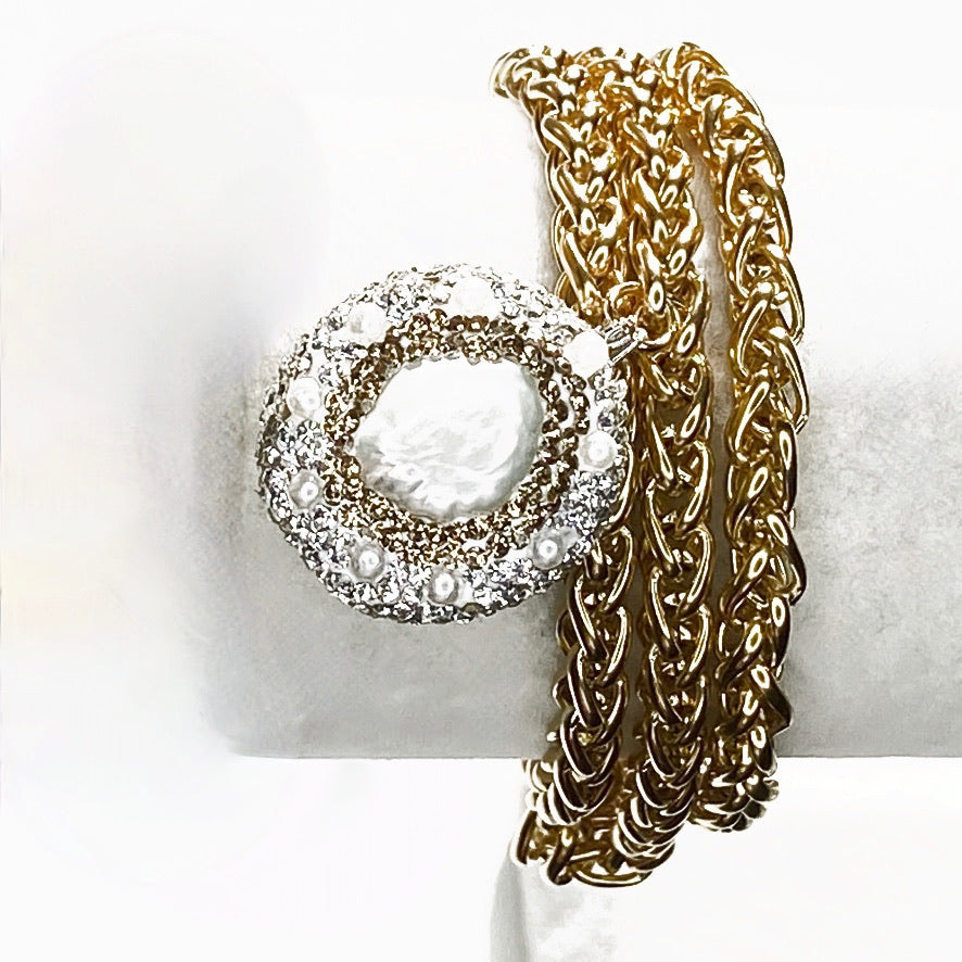 TRIPLE-STRAND GOLD OVER STAINLESS STEEL BRACELET WITH FRESH PEEARL BEAD PENDENT. by nyet jewelry