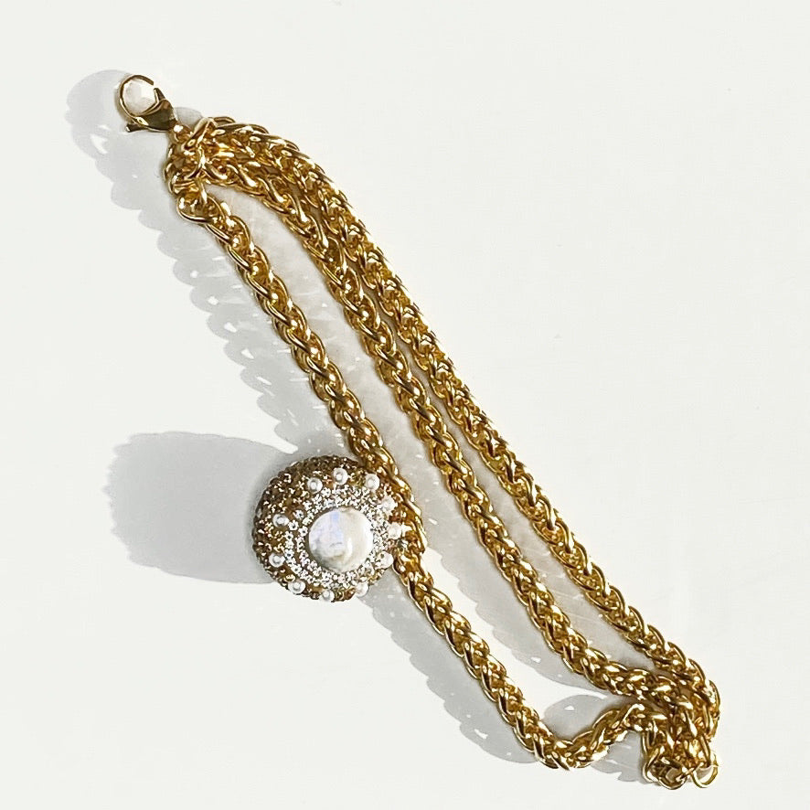 TRIPLE-STRAND GOLD OVER STAINLESS STEEL BRACELET WITH FRESH PEEARL BEAD PENDENT. by nyet jewelry