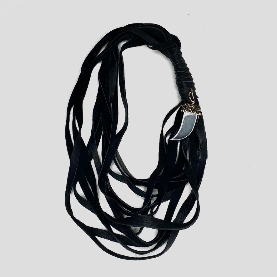 MULTI STRAND DEERSKIN LEATHER NECKLACE WITH PAVE RHINESTONE AND HEMATITE STONE PENDENT. by nyet jewelry