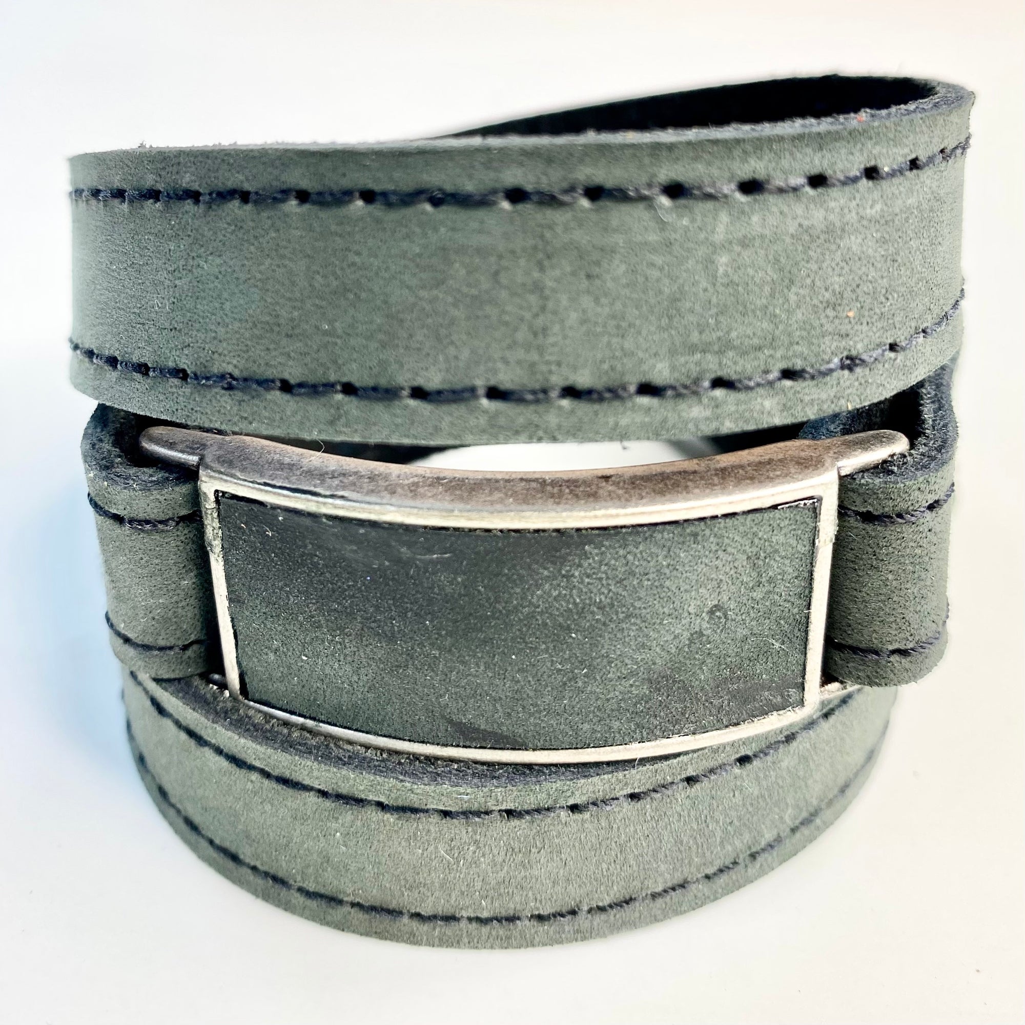 LEATHER WRAPAROUND WITH METAL LINK INLAID WITH MATCHING PIECE OF LEATHER WITH CUSTOM ENGRAVING by nyet jewelry Edit alt text Edit alt text