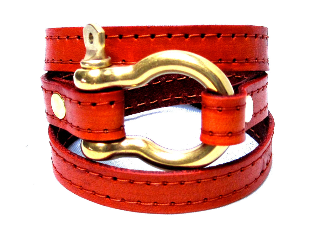 A customer review of the Signature Gold Shackle Wraparound Bracelet Orange