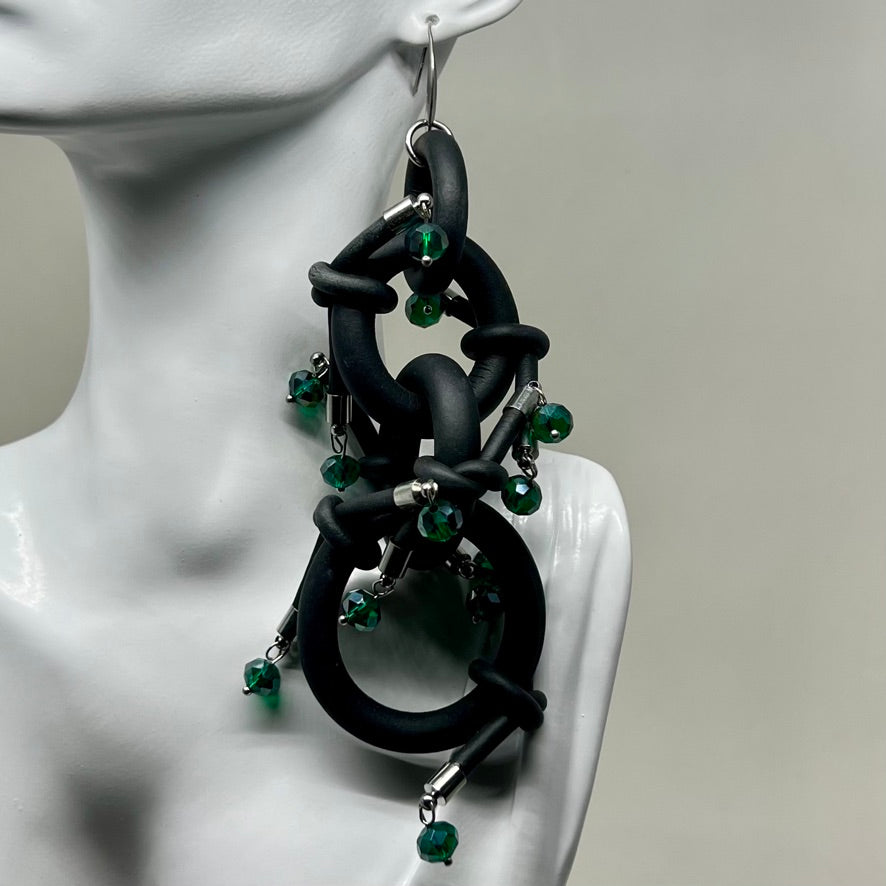 BLACK RUBBER EARRINGS WITH SILVER OR GOLD METAL PARTS AND GLASS BEADS. by nyet jewelry  Edit alt text