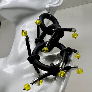 BLACK RUBBER EARRINGS WITH SILVER OR GOLD METAL PARTS AND GLASS BEADS. by nyet jewelry