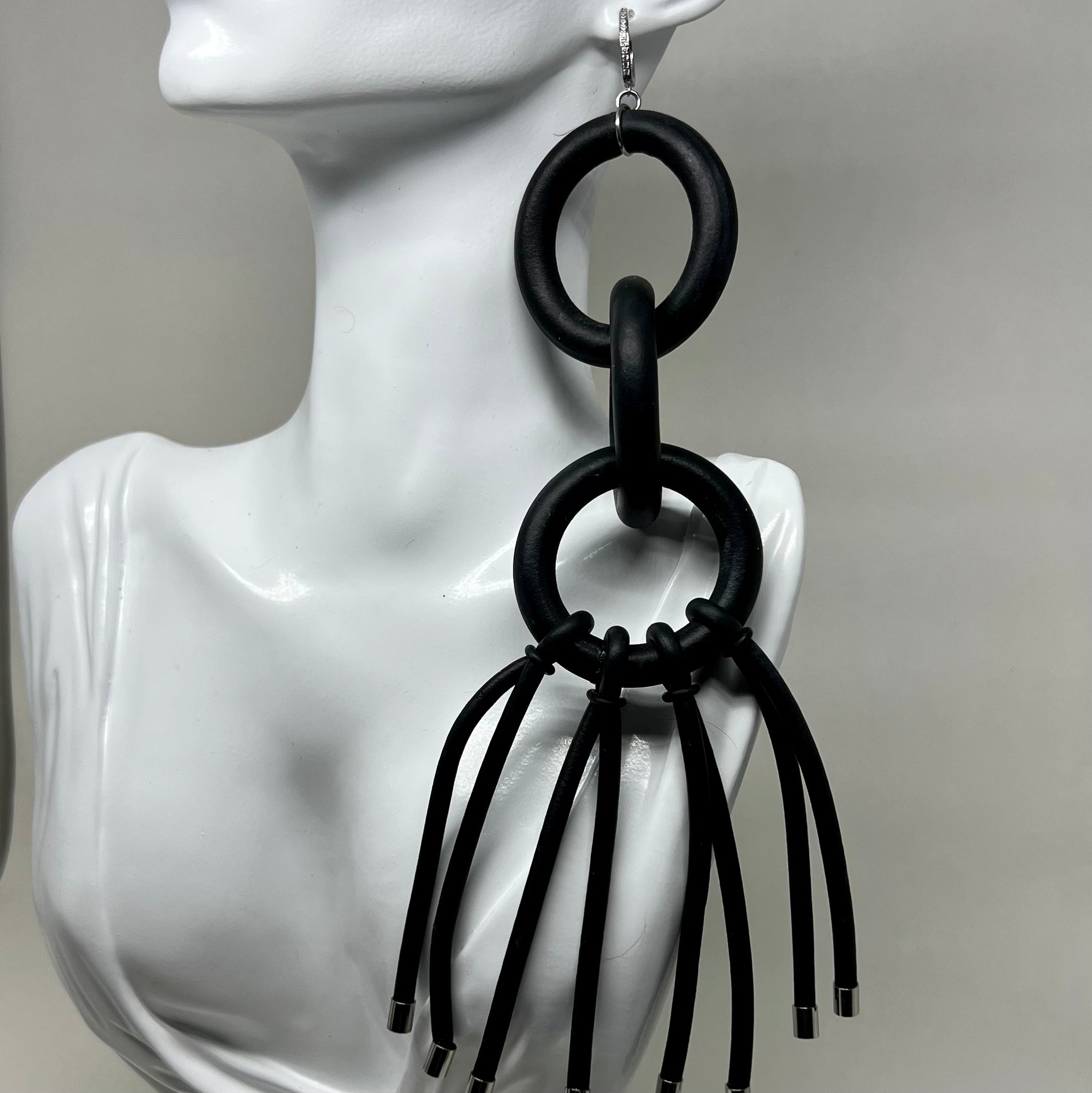 BLACK RUBBER EARRINGS WITH GOLD OR SILVER ENDCAP ACCENTS. by nyet jewelry