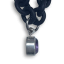 BLACK RUBBER NECKLACE WITH PENDENT BEZEL SET IN SILVER WITH A LARGE PURPLE AMETHYST STONE.
