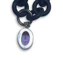 BLACK RUBBER NECKLACE WITH PENDENT BEZEL SET IN SILVER WITH A LARGE PURPLE AMETHYST STONE.
