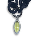 BLACK RUBBER NECKLACE WITH OVAL-CUT FACETED LEMON TOPAZ GEMSTONE BEZEL SET IN SILVER. nyet jewelry