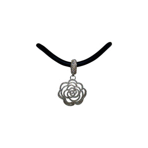 BLACK RUBBER NECKLACE WITH LARGE CAMELLIA FLOWER PAVE'D WITH SPARKLING CZ STONES PENDENT. by NYET Jewelry