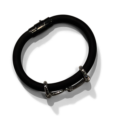 BLACK RUBBER STRAND BRACELET WITH MAGNETIC STAINLESS STEEL CLOSURE AND HORSE BIT ADORNMENT by nyet jewelry