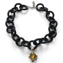 BLACK RUBBER NECKLACE WITH PENDENT BEZEL SET IN SILVER WITH A CITRINE AND PERIDOTS. by nyet jewelry