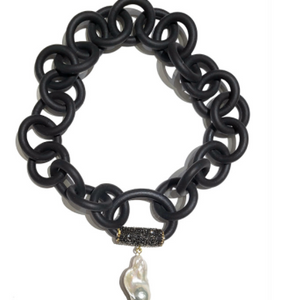 BLACK RUBBER NECKLACE WITH GENUINE LARGE BAROQUE PEARL ATTACHED TO A BAIL PAVE'S WITH AUSTRIAN CRYSTALS. BY NYET JEWELRY