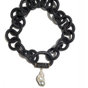 BLACK RUBBER NECKLACE WITH GENUINE LARGE BAROQUE PEARL ATTACHED TO A BAIL PAVE'S WITH AUSTRIAN CRYSTALS. BY NYET JEWELRY