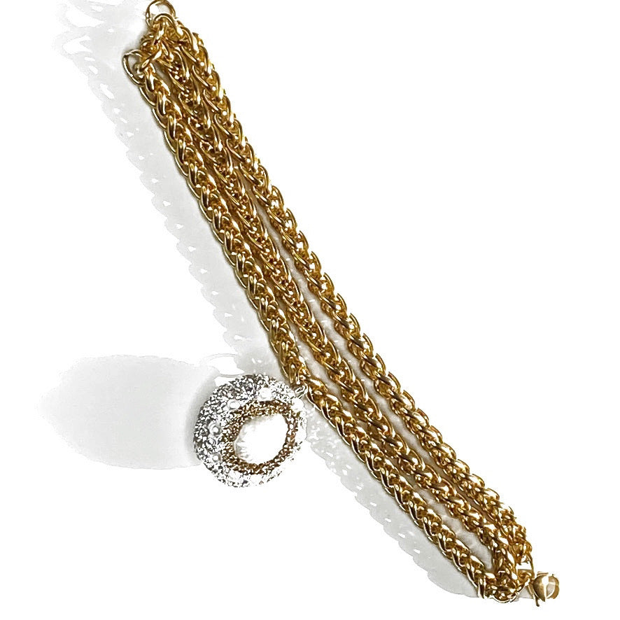 TRIPLE-STRAND GOLD OVER STAINLESS STEEL BRACELET WITH FRESH PEEARL BEAD PENDENT. by nyet jewelry 