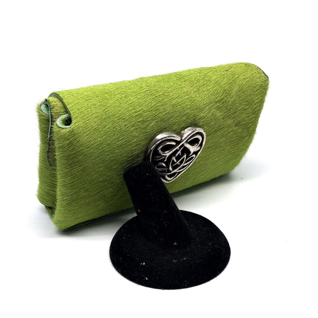 GRASS GREEN HAIR-ON COWHIDE 2-COMPARTMENT WALLET WITH SNAP CLOSURE.