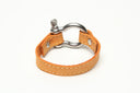 SIGNATURE STITCHED LEATHER AND STAINLESS STEEL SHACKLE BY NYET JEWELRY.