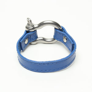 SIGNATURE STITCHED LEATHER AND STAINLESS STEEL SHACKLE BY NYET JEWELRY.
