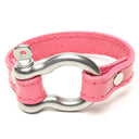 SIGNATURE STITCHED LEATHER AND STAINLESS STEEL SHACKLE BY NYET JEWELRY.