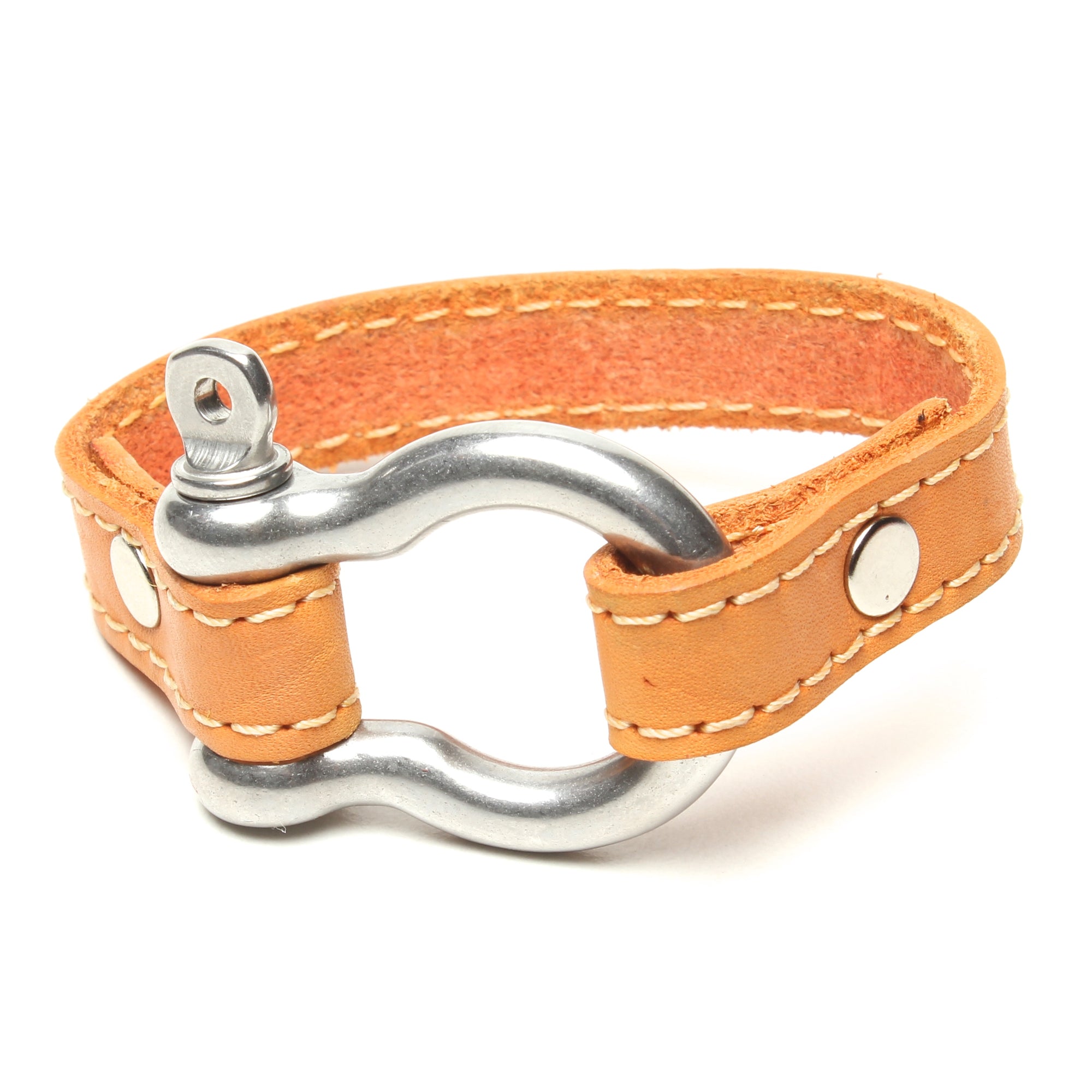 SIGNATURE STITCHED LEATHER AND STAINLESS STEEL SHACKLE BY NYET JEWELRY.