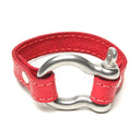 SIGNATURE STITCHED LEATHER AND STAINLESS STEEL SHACKLE BY NYET JEWELRY.