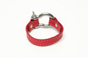 SIGNATURE STITCHED LEATHER AND STAINLESS STEEL SHACKLE BY NYET JEWELRY.