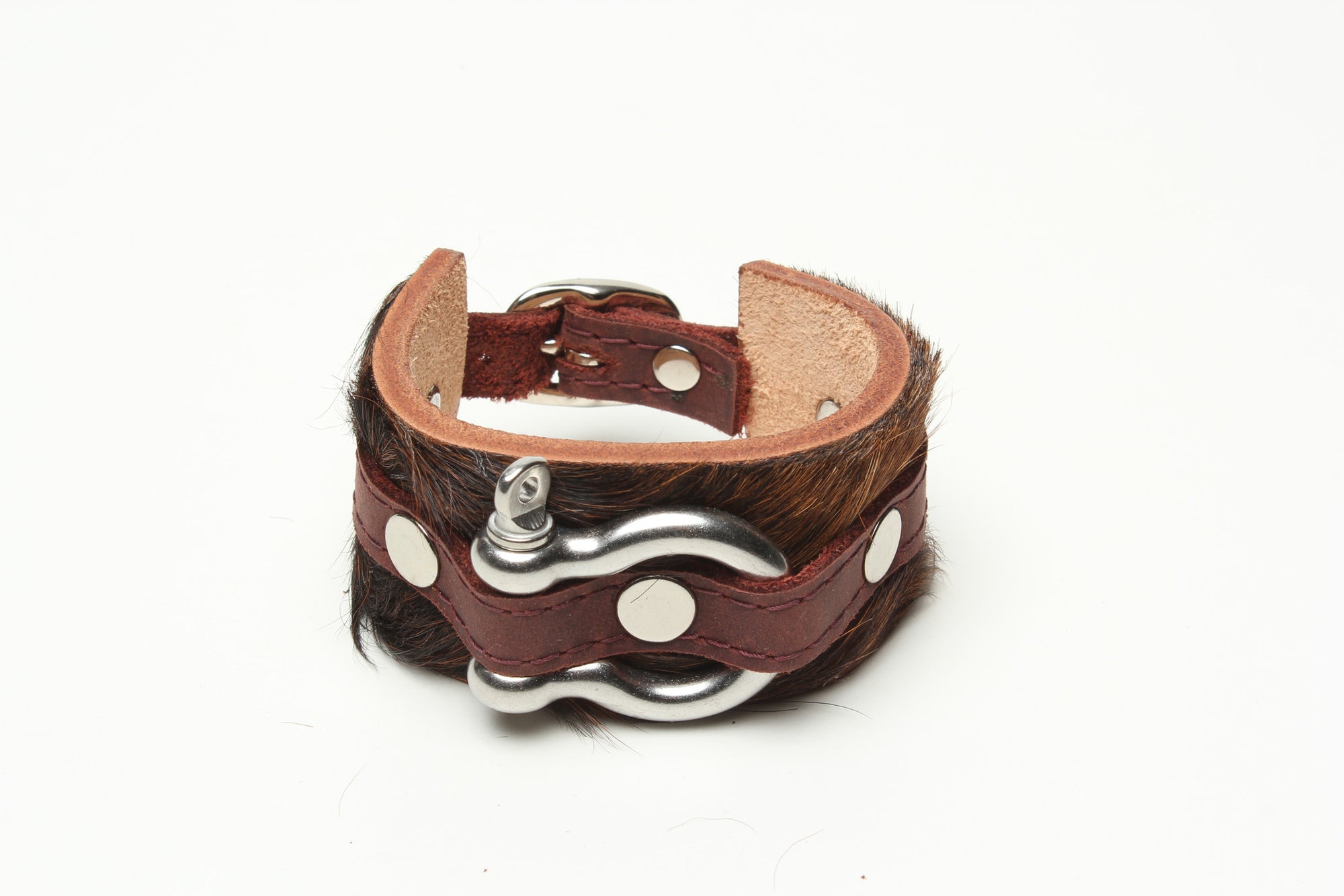 Shackle Latigo cuff Hair On Cowhide by NYET Jewelry.