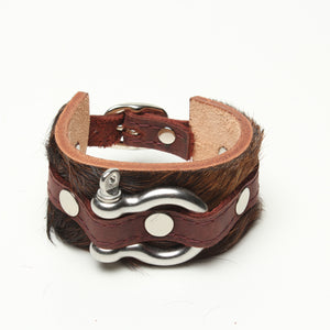 Shackle Latigo cuff Hair On Cowhide by NYET Jewelry.