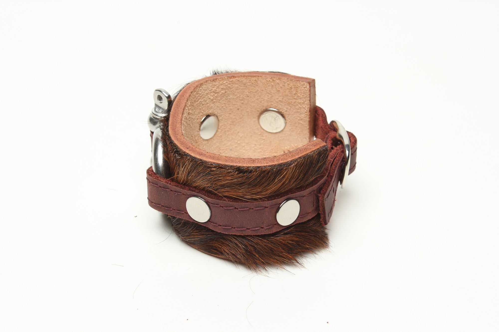 Shackle Latigo cuff Hair On Cowhide by NYET Jewelry.