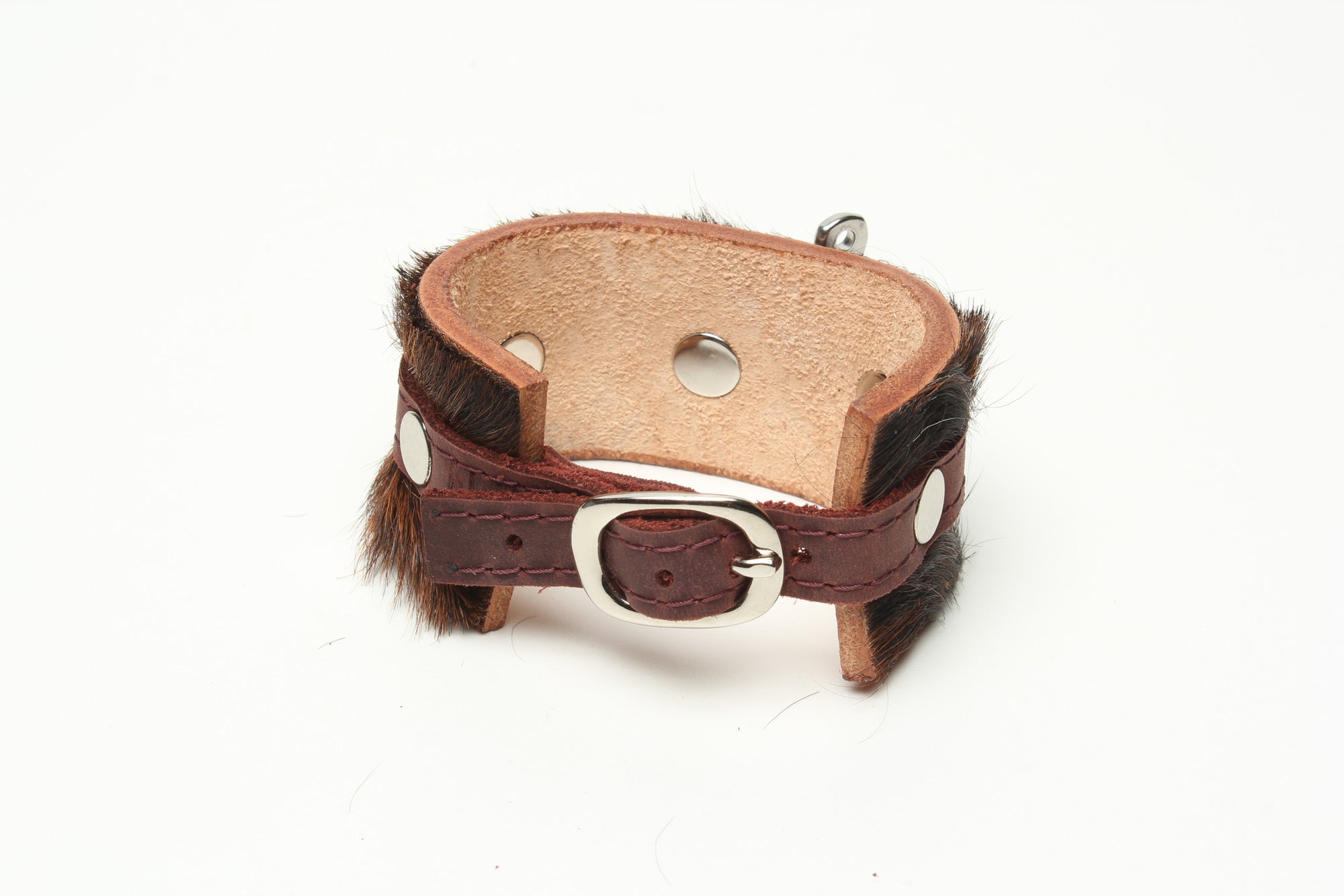 Shackle Latigo cuff Hair On Cowhide by NYET Jewelry.