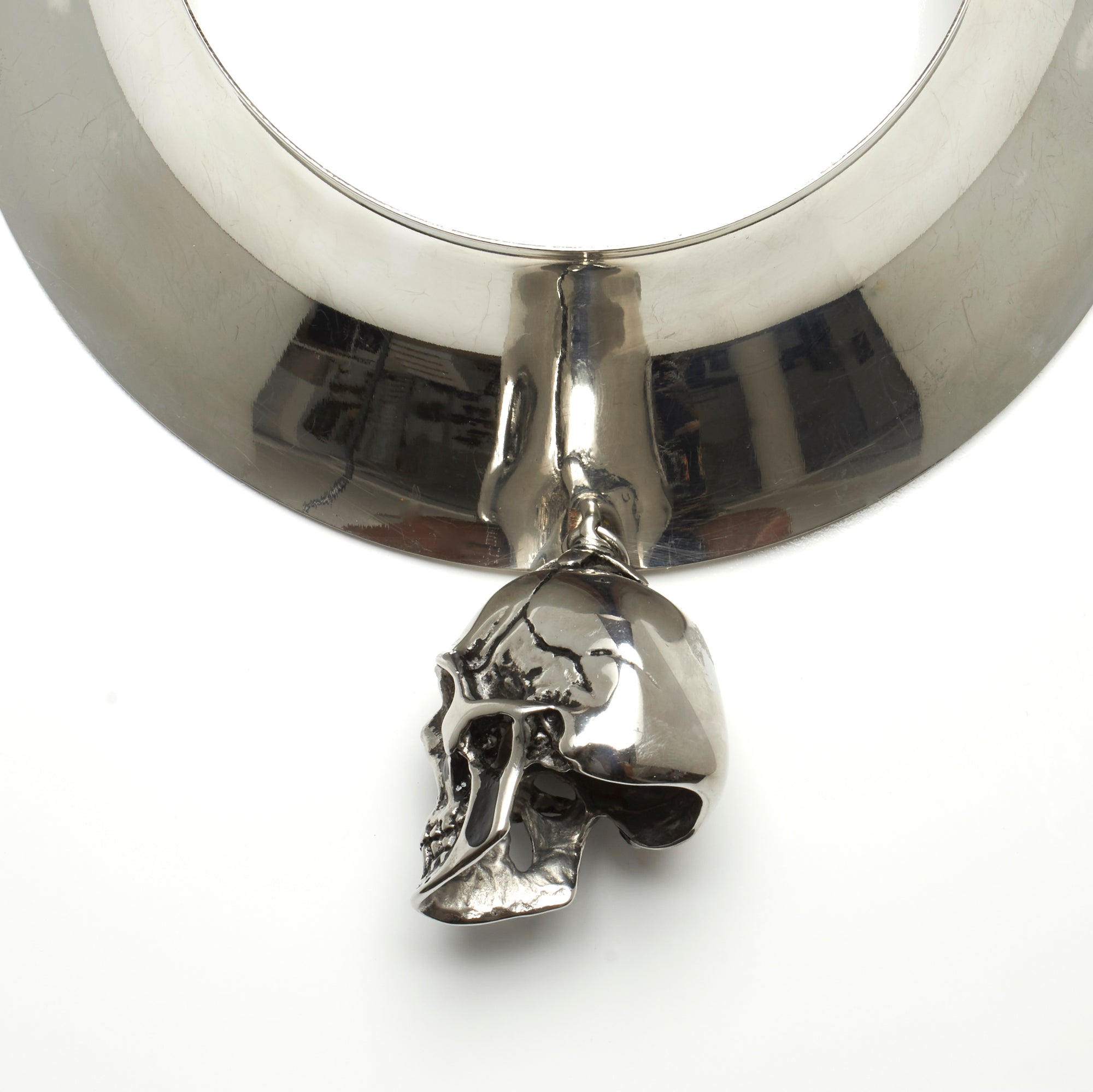 THICK TORQUE NECKLACE WITH LARGE STAINLESS STEEL SKULL PENDENT. BY NYET JEWELRY.