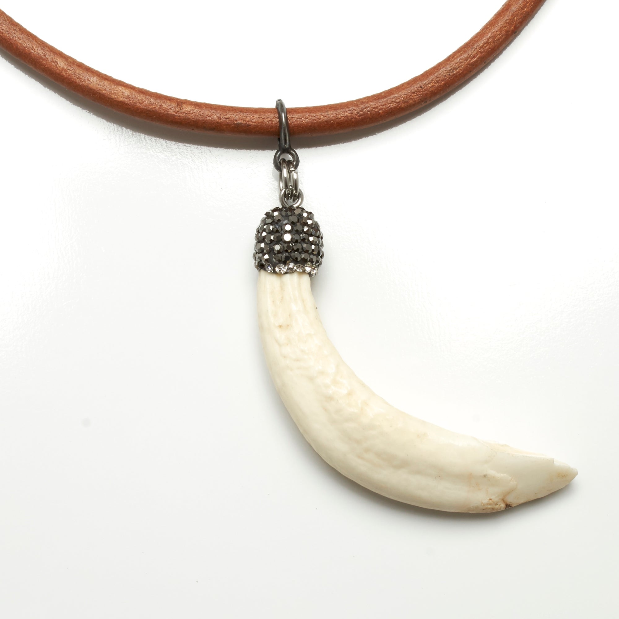 5 MM ROUND LEATHER NECKLACE WITH WILD BOAR'S TOOTH PENDANT AND RHINESTONES. by nyet jewelry.