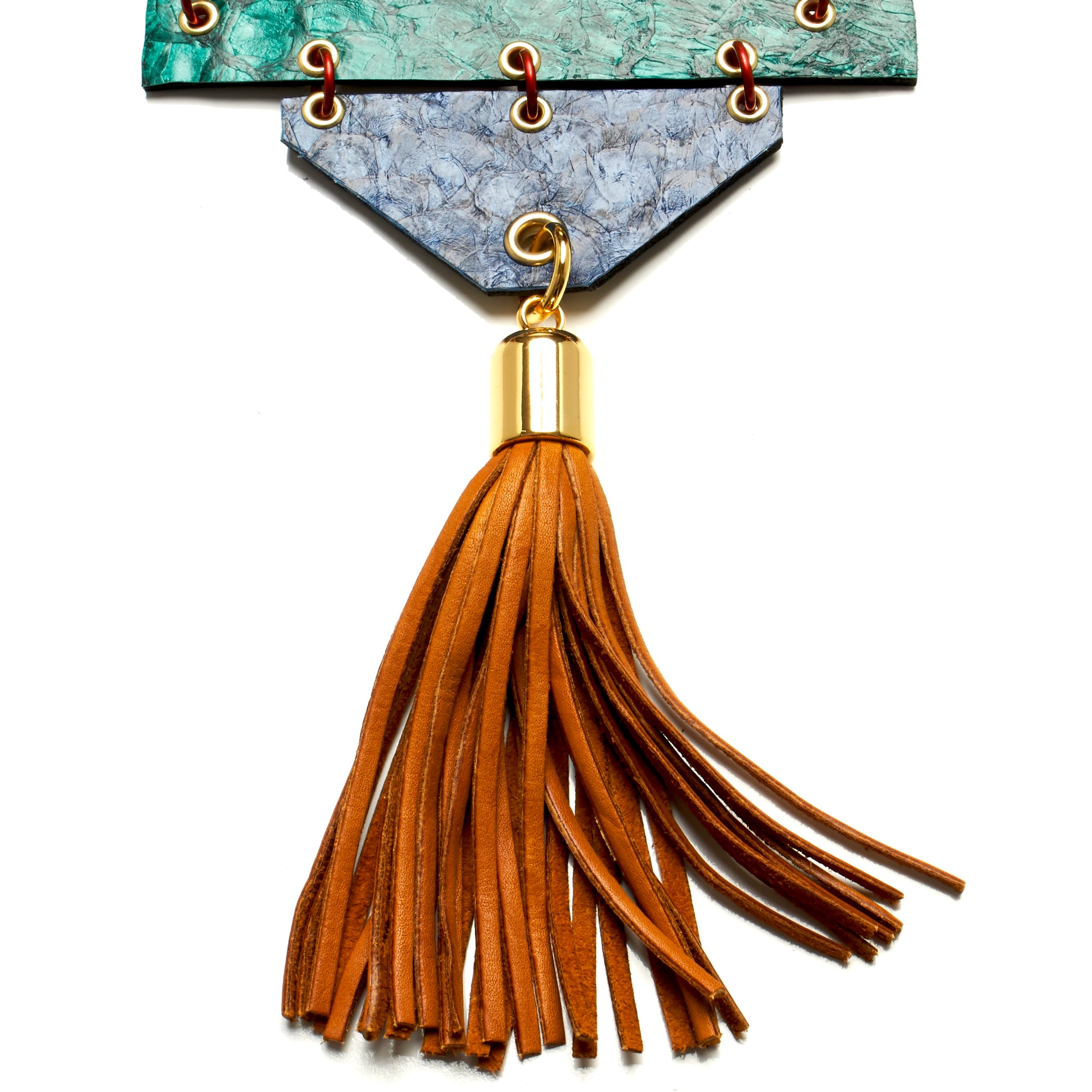 THICK ROUND SOLID BRASS TORQUE NECKLACE WITH HINGED PANELS MADE OF FISH LEATHER WITH DEERSKIN TASSEL BY NYET JEWELRY.