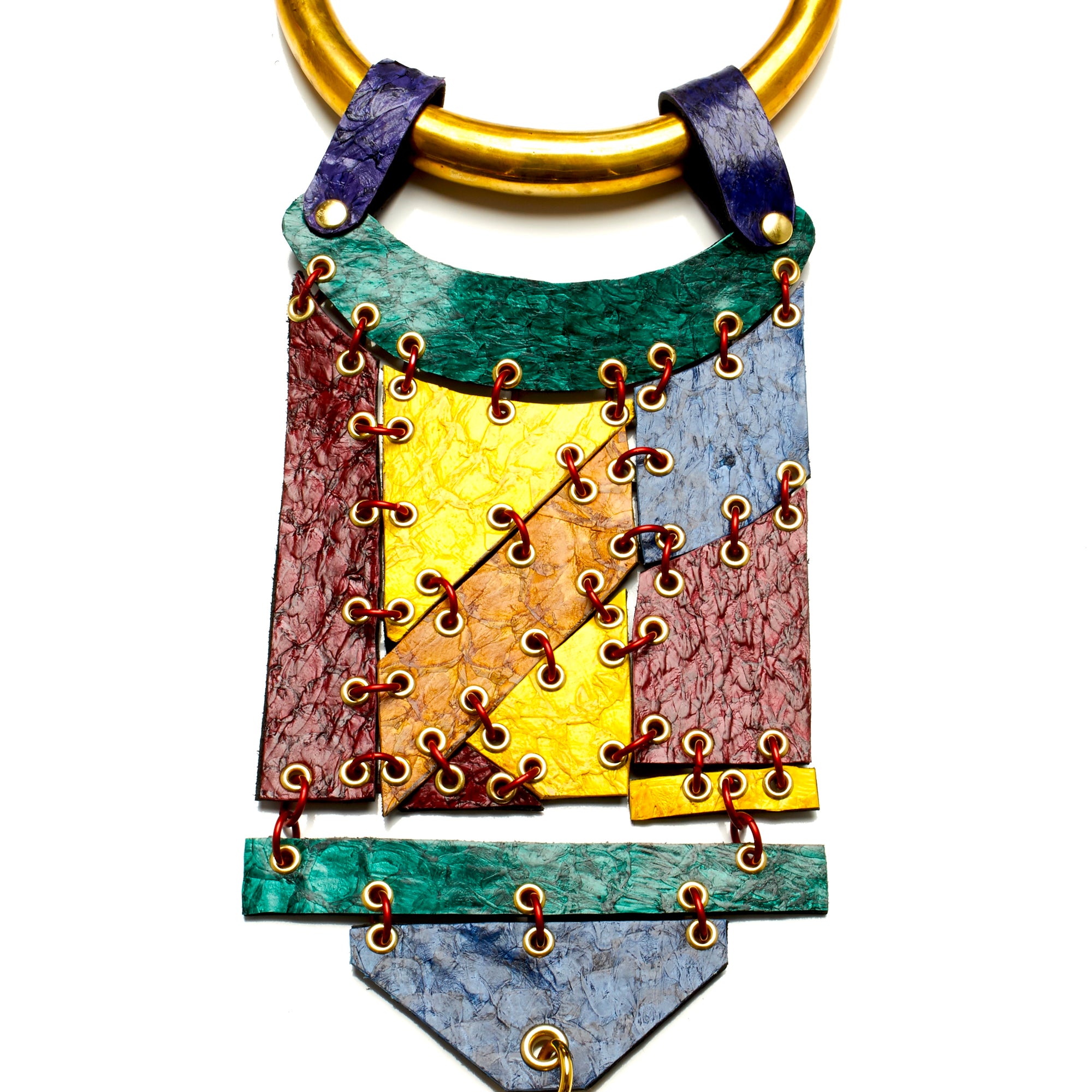 THICK ROUND SOLID BRASS TORQUE NECKLACE WITH HINGED PANELS MADE OF FISH LEATHER WITH DEERSKIN TASSEL BY NYET JEWELRY.