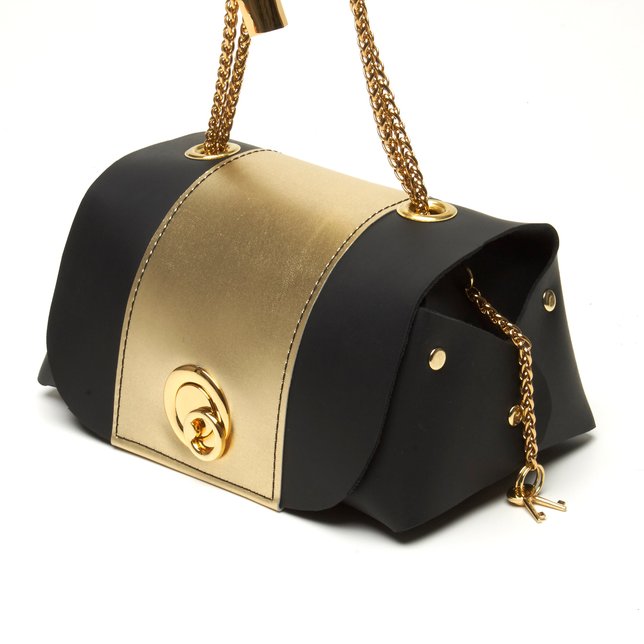 black and gold leather "grande lunch bag" by NYET Jewelry.