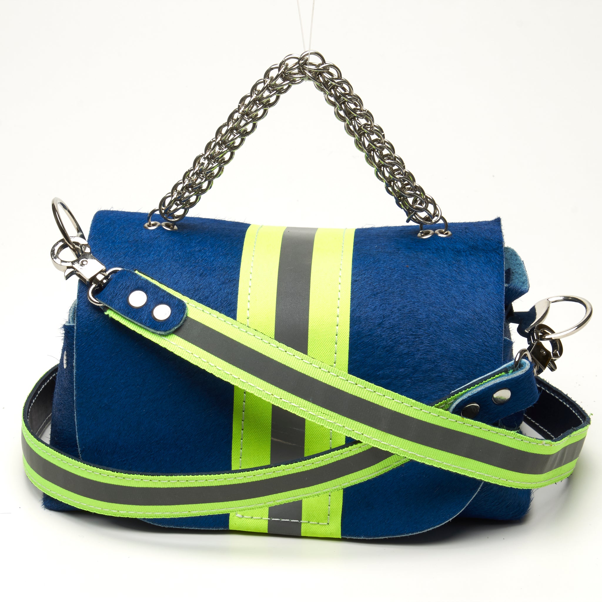 HAIR-ON COWHIDE LEATHER WITH WIDE NEON YELLOW REFLECTIVE TRIM. By NYET Jewelry.