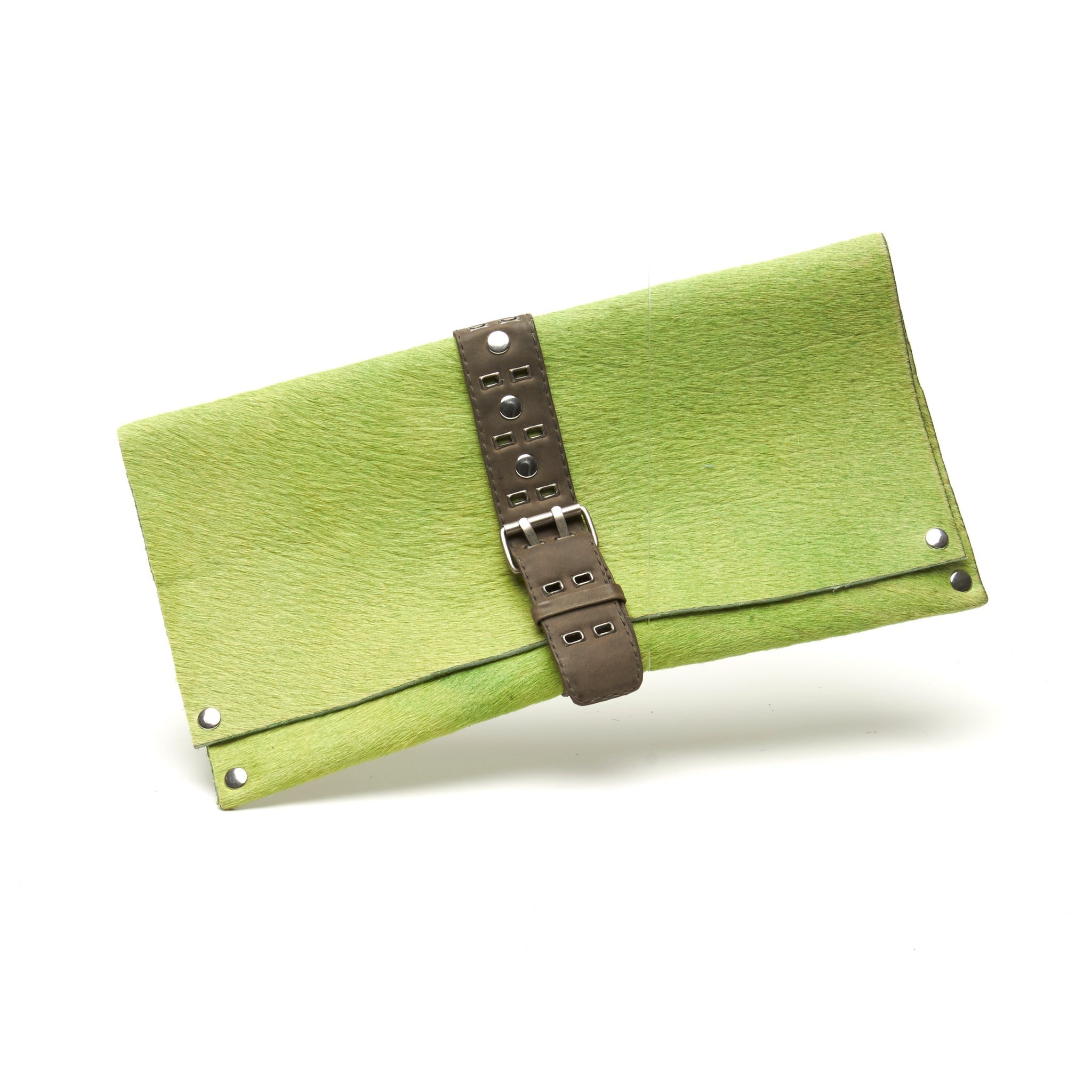 GREEN HAIR-ON COWHIDE CLUTCH WITH DETAILED UTILITY LEATHER STRAP AND BELT BUCKLE-STYLE CLOSURE by nyet jewelry