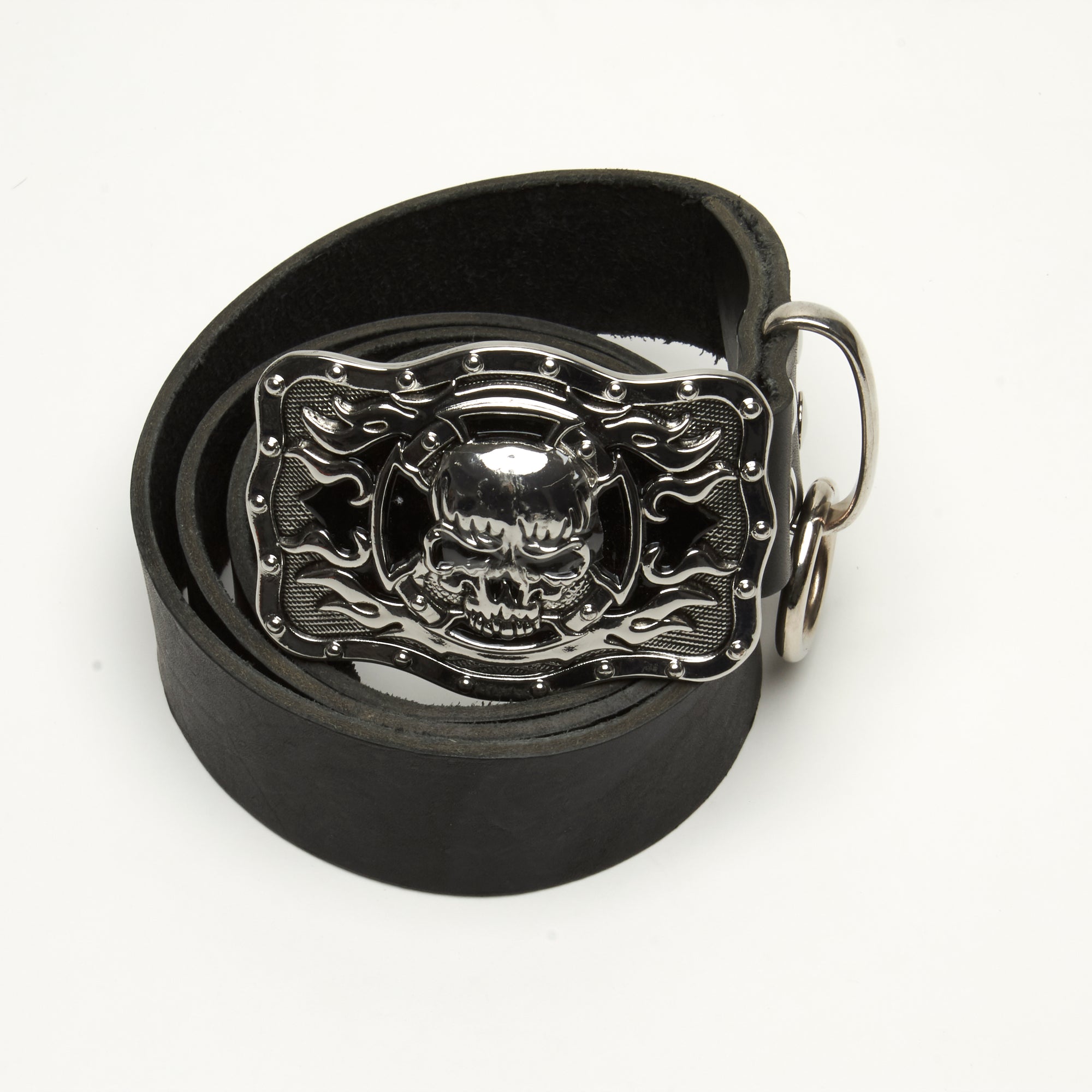 LEATHER BELT WITH HEAVY METAL AND BLACK ENAMEL SKULL BUCKLE ADORNED WITH THICK RING AT BELT LOOP. by NYET Jewelry.