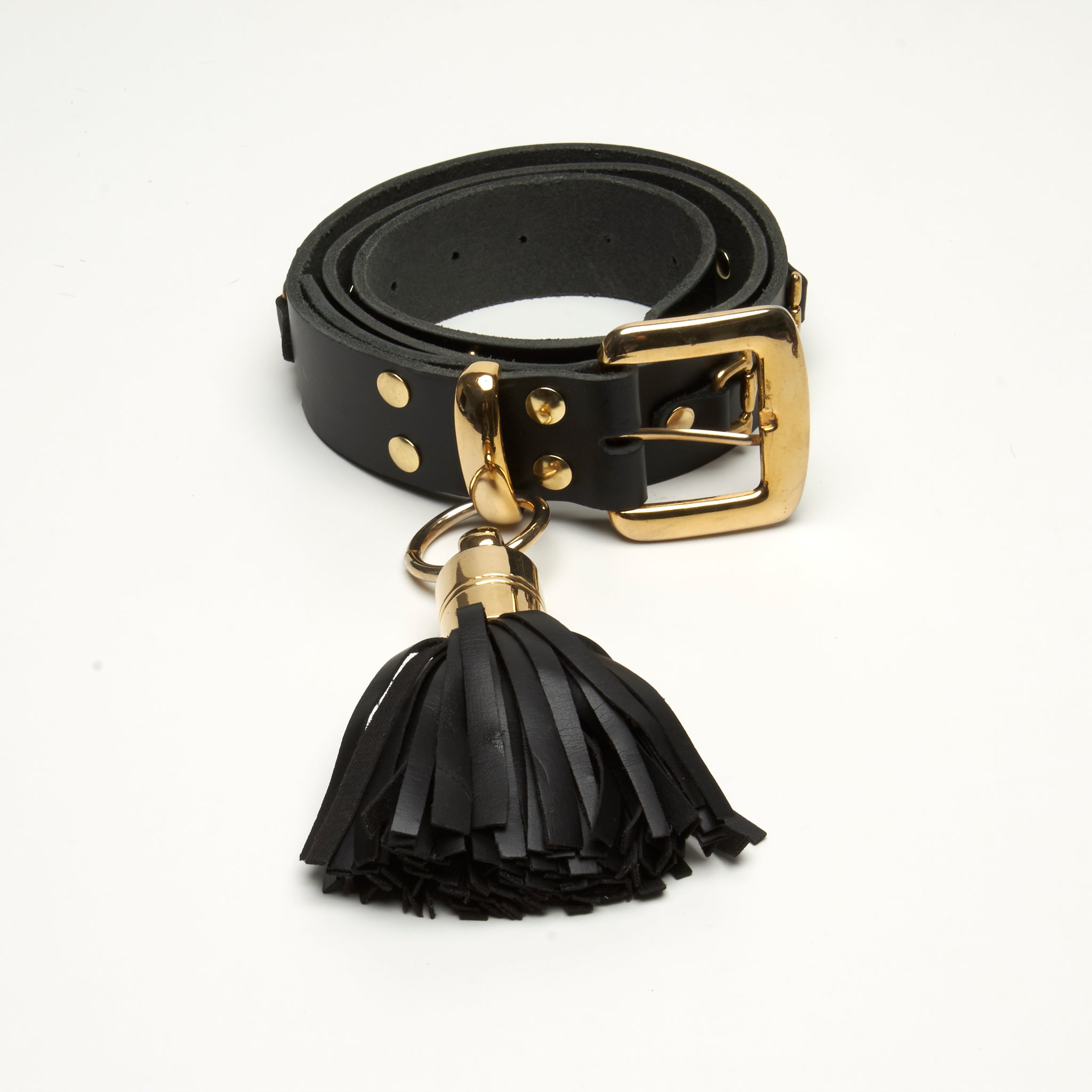LEATHER, GOLD HORSE BIT D-RING HARDWARE AND TASSEL. by NYET Jewelry.
