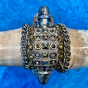 MOUNTED TEXAS LONGHORN STEER HORNS WITH METAL ADORNMENTS AND CHAINS by NYET Jewelry.