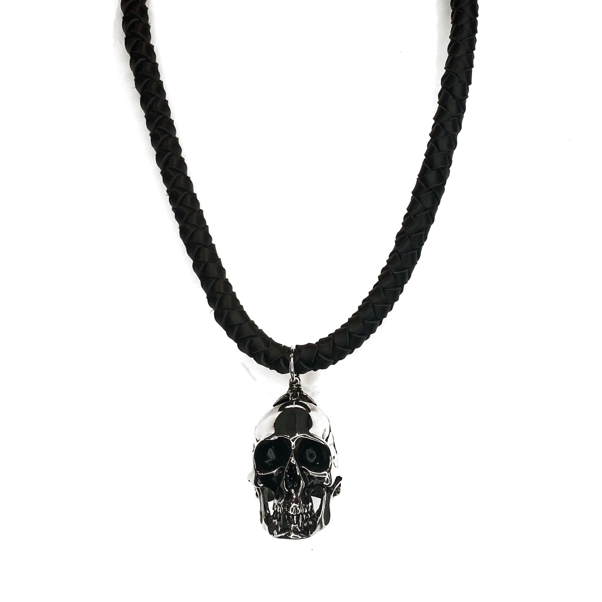 THICK HAND-BRAIDED DEERSKIN LEATHER NECKLACE WITH HEAVYWEIGHT SKULL PENDANT. by nyet jewelry  Edit alt text