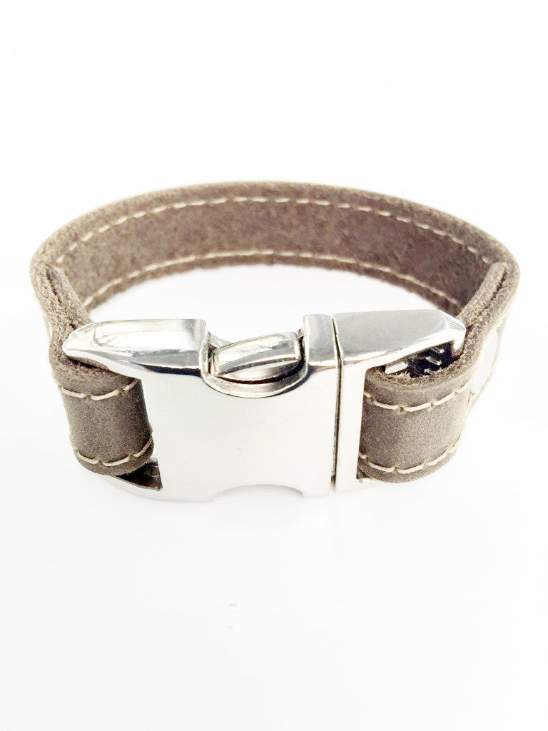 Distressed leather bracelet with side squeeze aluminum buckle