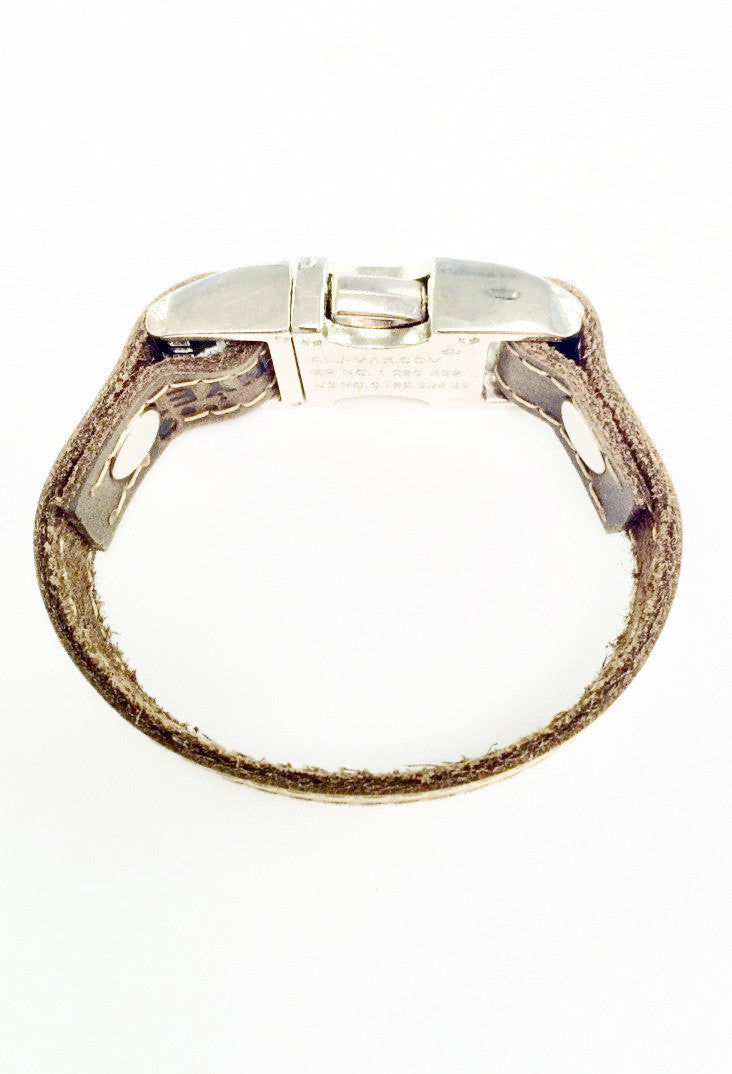 Distressed leather bracelet with side squeeze aluminum buckle