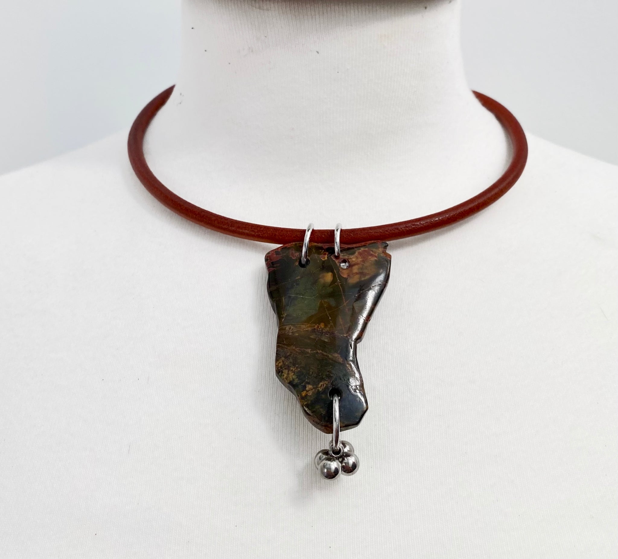 5 MM ROUND LEATHER NECKLACE WITH POLISHED STONE PENDENT AND STAINLESS STEEL BEADS. by nyet jewelry