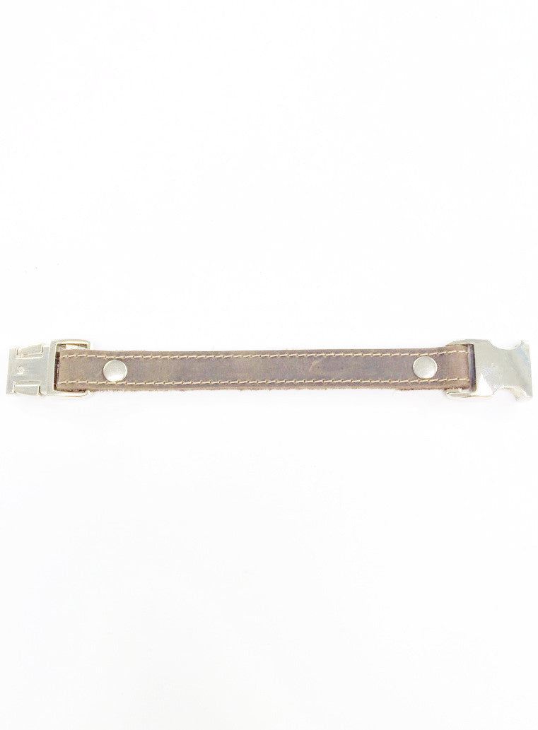 Distressed leather bracelet with side squeeze aluminum buckle